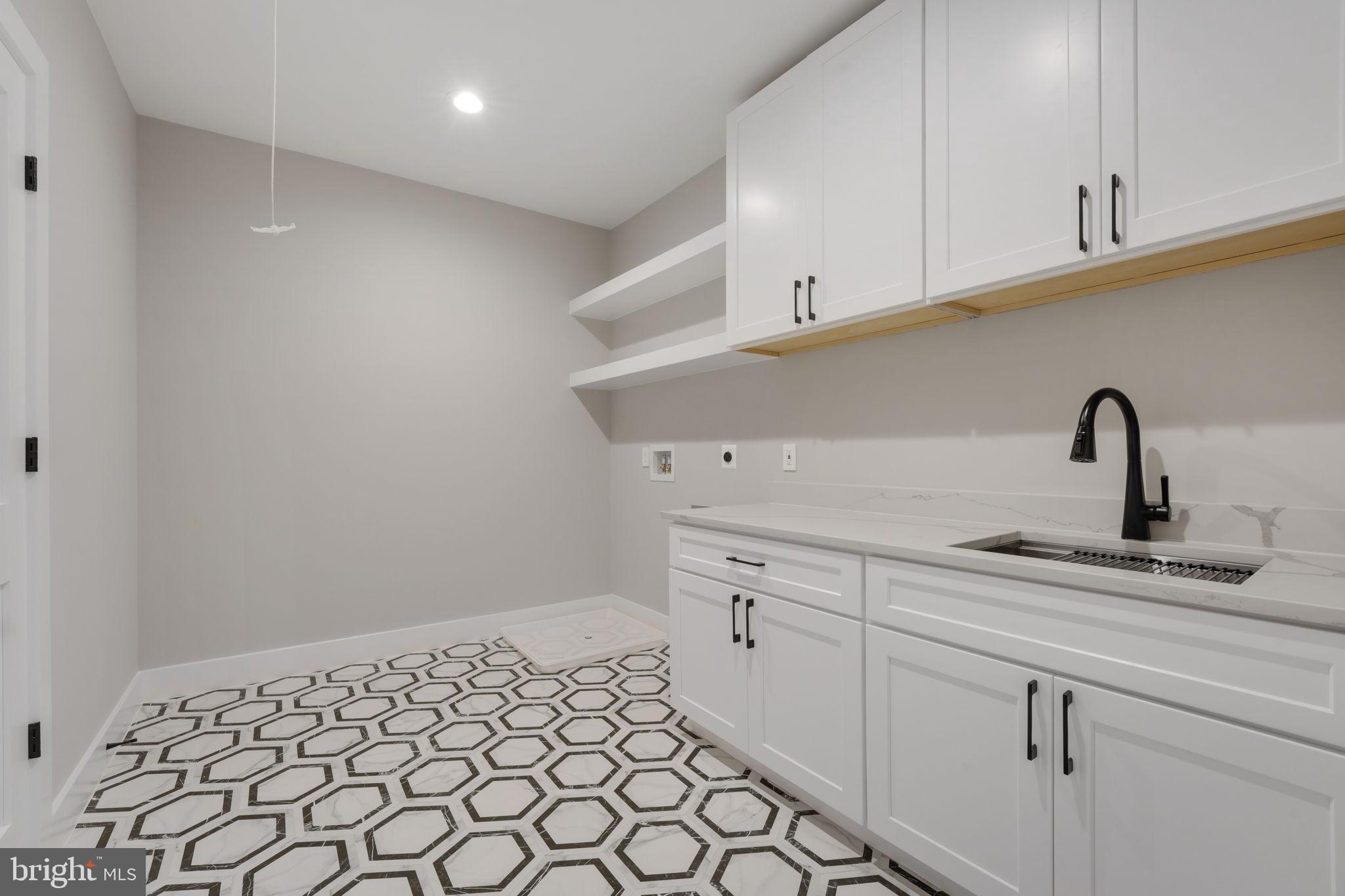 7925 Falstaff Road McLean, VA 22102 - Photo 50 of 58 Upper level laundry room (from previous build)