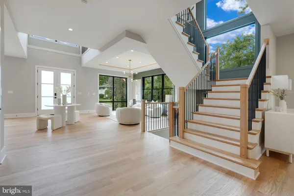 a view of an entryway and livingroom with furniture