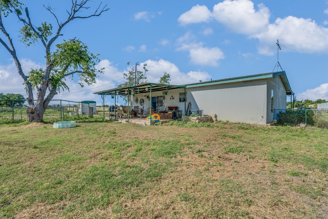 3007 County Road 303 Jarrell, TX 76537 - Photo 15 of 36 a front view of a house with garden