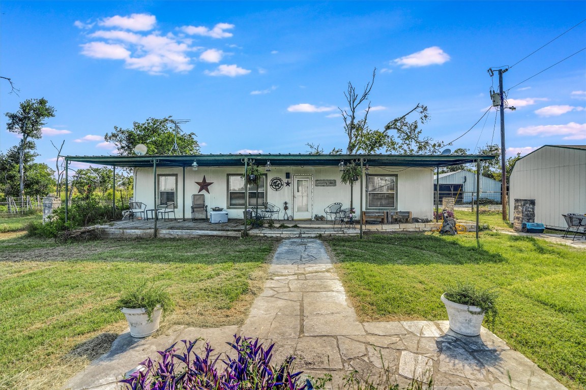 3007 County Road 303 Jarrell, TX 76537 - Photo 2 of 36 a view of a house with swimming pool and sitting area