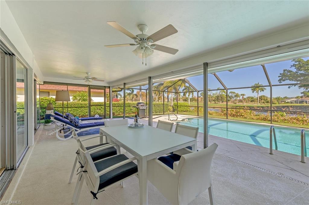 239 Torrey Pines Point Naples, FL 34113 - Photo 7 of 36 a view of a dining room with furniture window and outside view