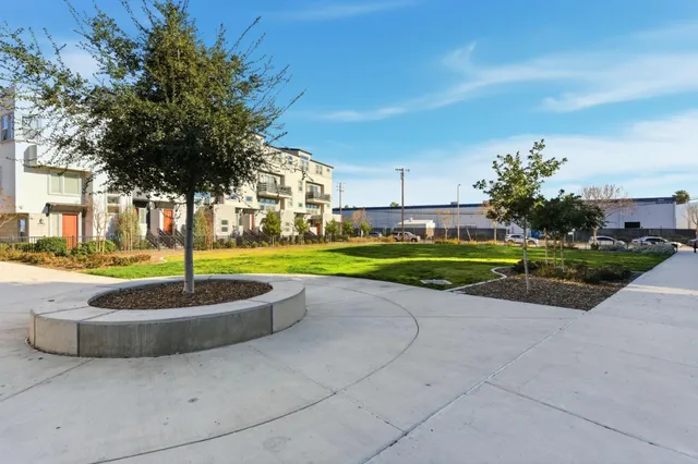 a swimming pool with outdoor seating and yard