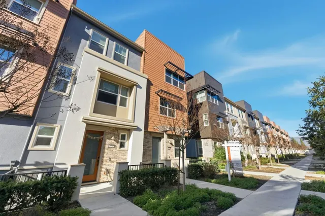 a front view of a multi story residential apartment building