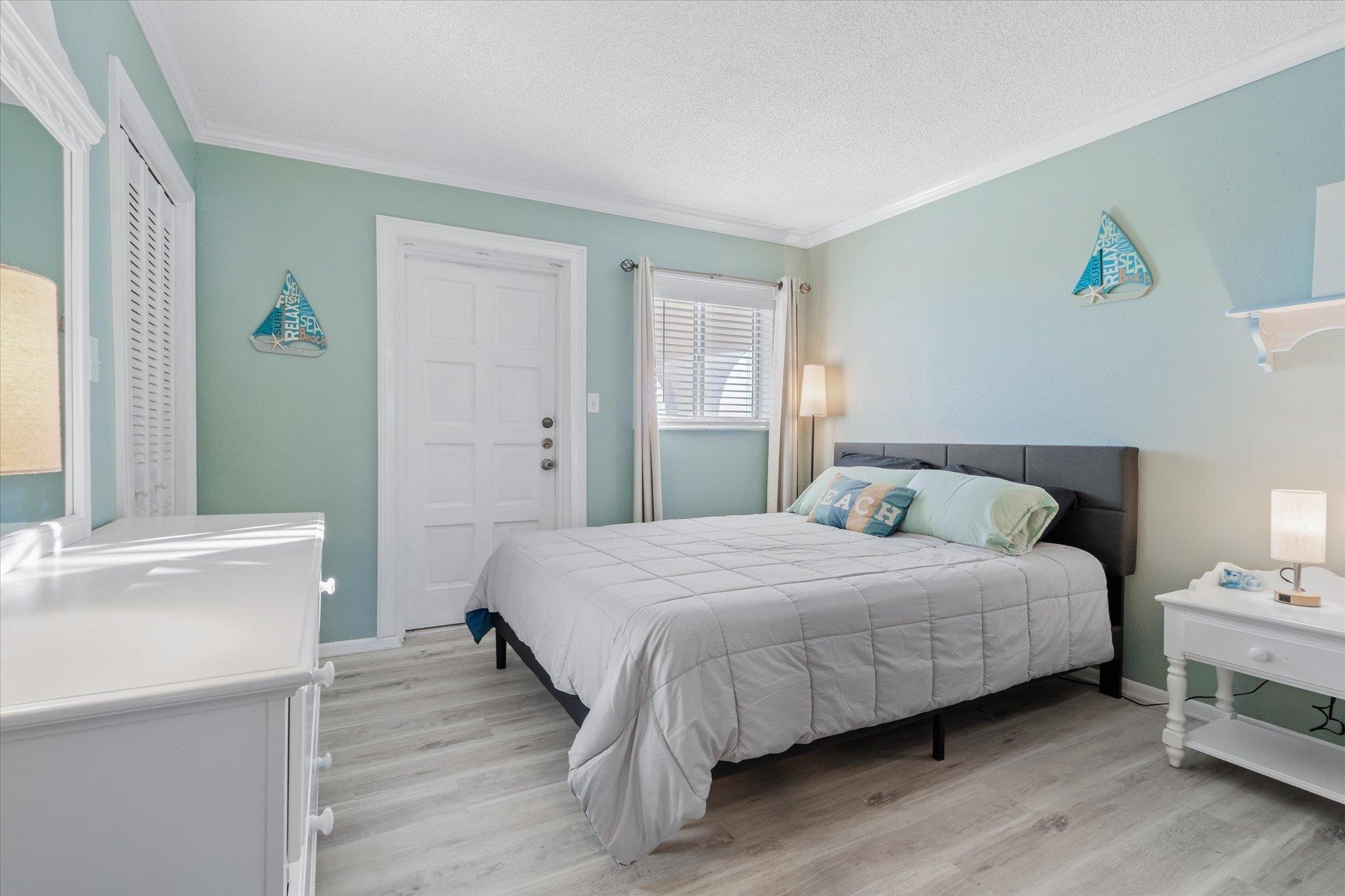 1 Ocean Trace Road, Unit 242 St. Augustine, FL 32080 - Photo 22 of 66 a bedroom with a bed and a table