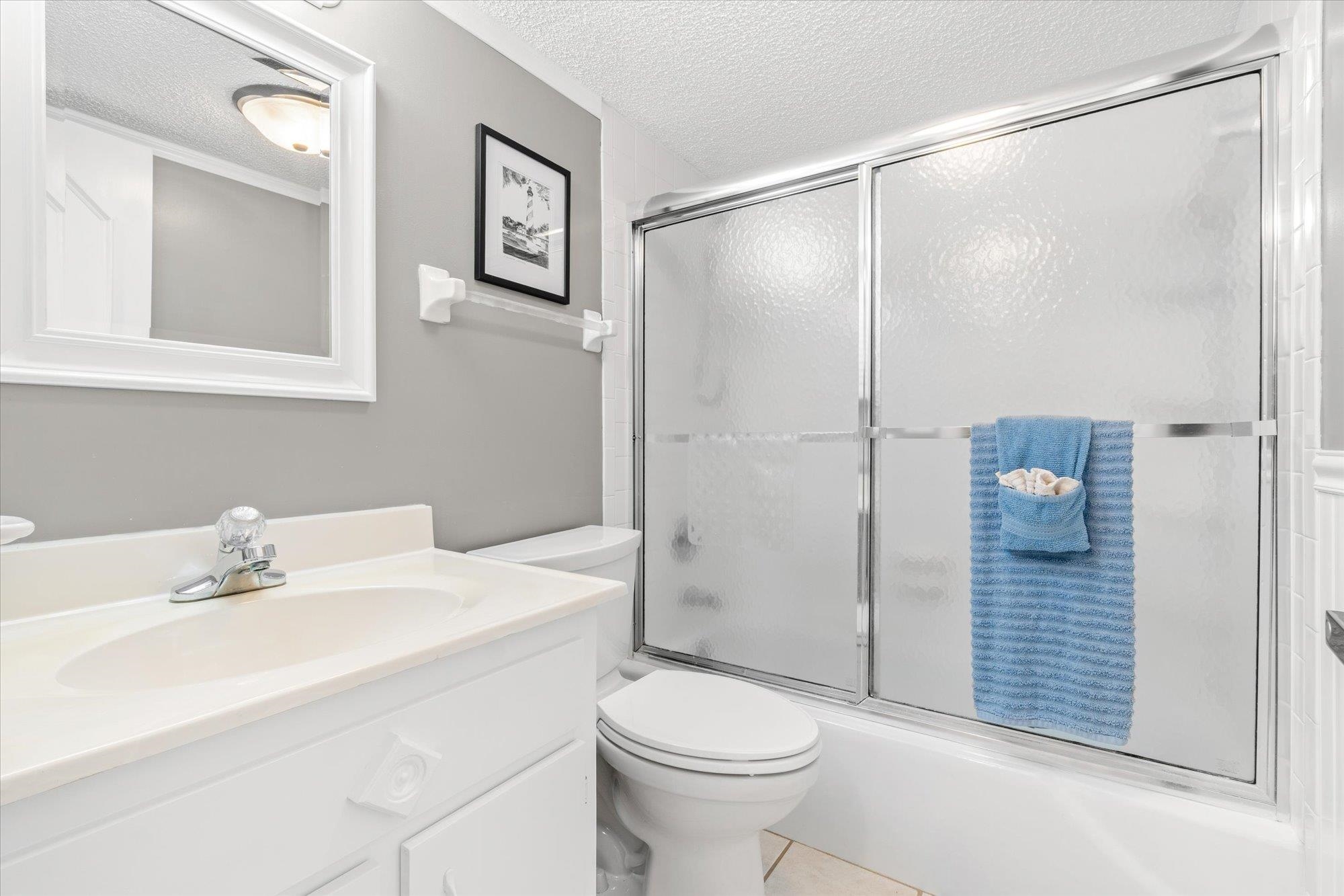 1 Ocean Trace Road, Unit 242 St. Augustine, FL 32080 - Photo 23 of 66 a bathroom with a sink toilet and shower