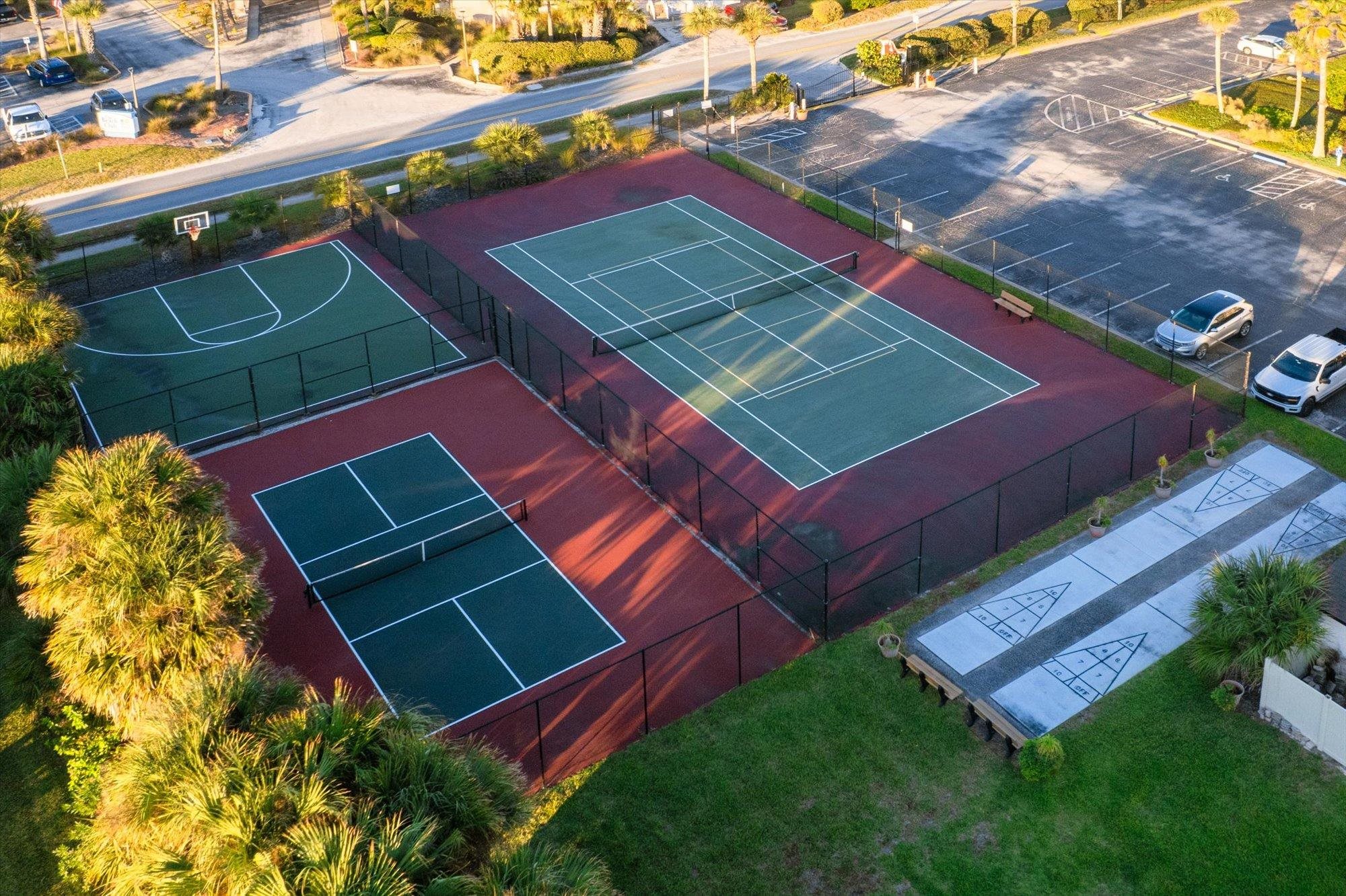 1 Ocean Trace Road, Unit 242 St. Augustine, FL 32080 - Photo 41 of 66 a view of a tennis ground with sitting area
