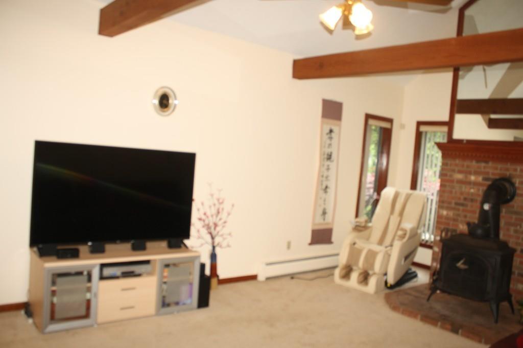 82 Stillwater Road Deerfield, MA 01373 - Photo 11 of 22 a view of a livingroom with furniture and a flat screen tv