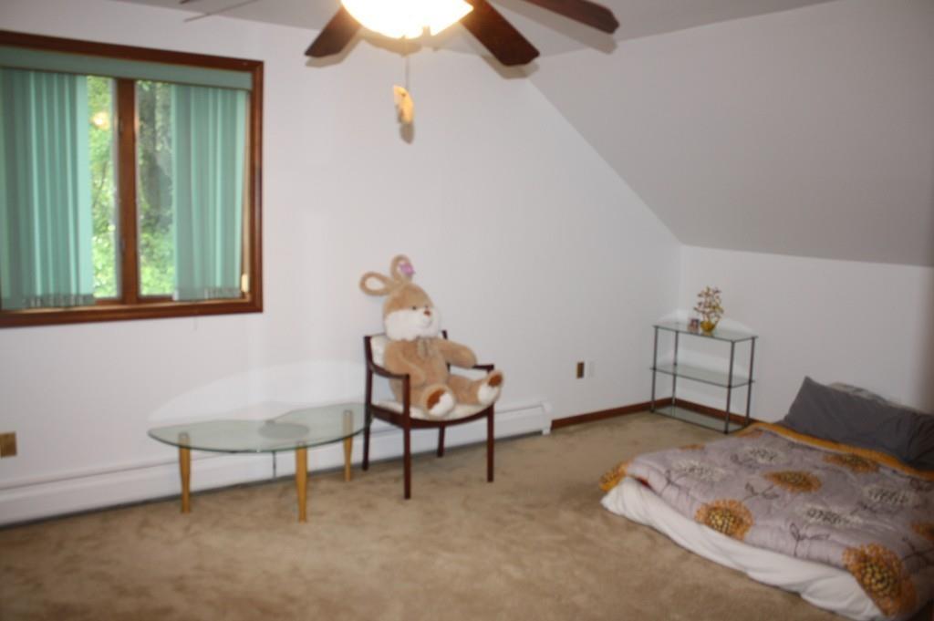 82 Stillwater Road Deerfield, MA 01373 - Photo 13 of 22 a bedroom with a bed and a window