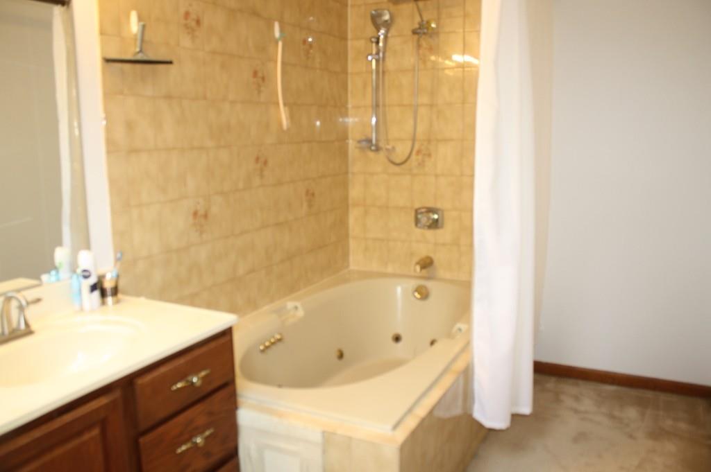 82 Stillwater Road Deerfield, MA 01373 - Photo 18 of 22 a bathroom with a bathtub and a sink
