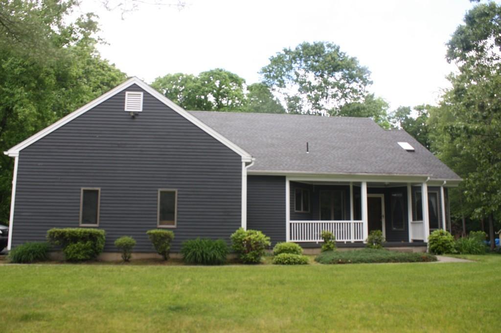 82 Stillwater Road Deerfield, MA 01373 - Photo 2 of 22 a front view of a house with a yard and garage