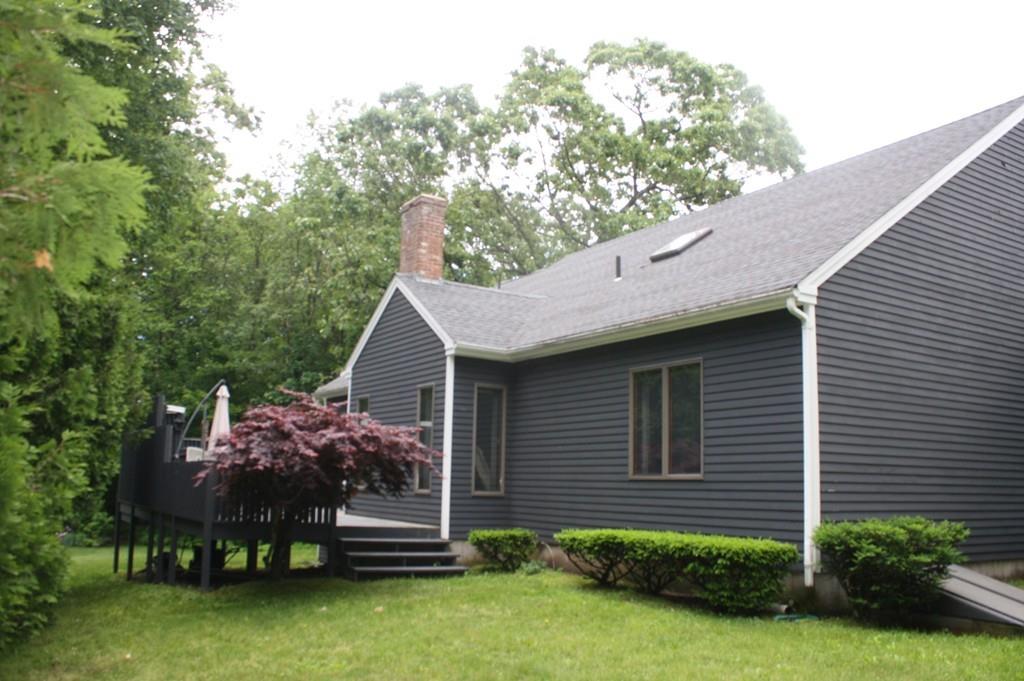82 Stillwater Road Deerfield, MA 01373 - Photo 4 of 22 a front view of a house with a garden