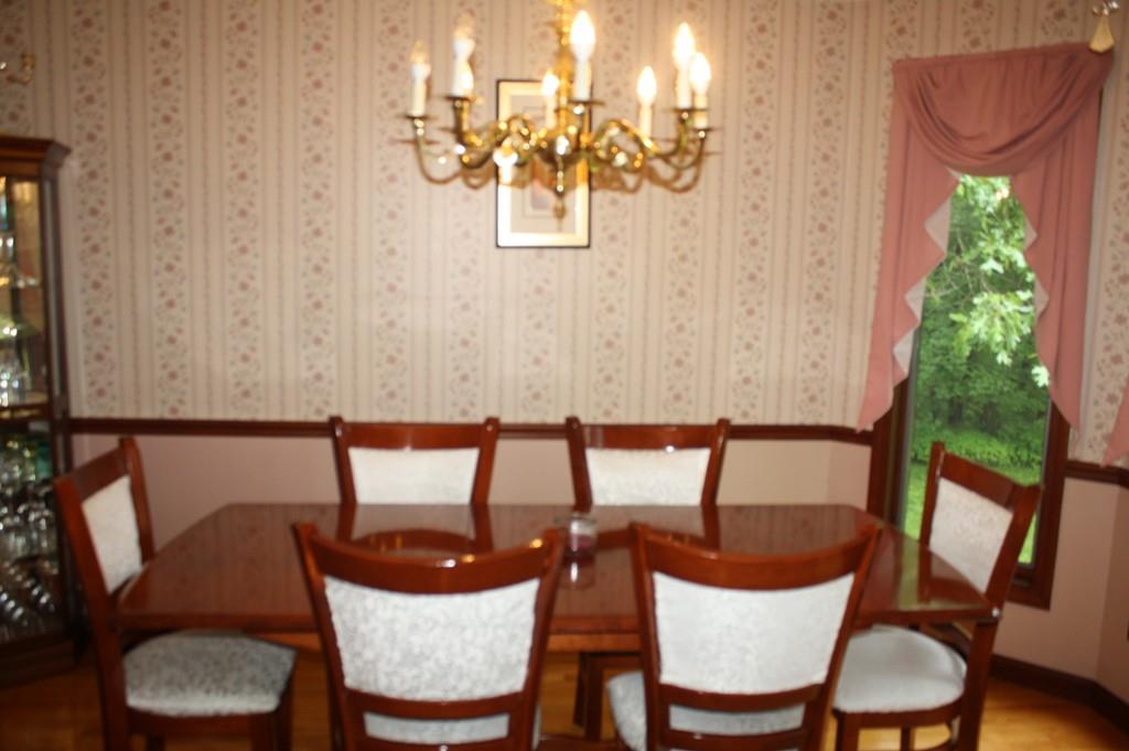 82 Stillwater Road Deerfield, MA 01373 - Photo 8 of 22 a view of a dining room with furniture and wooden floor