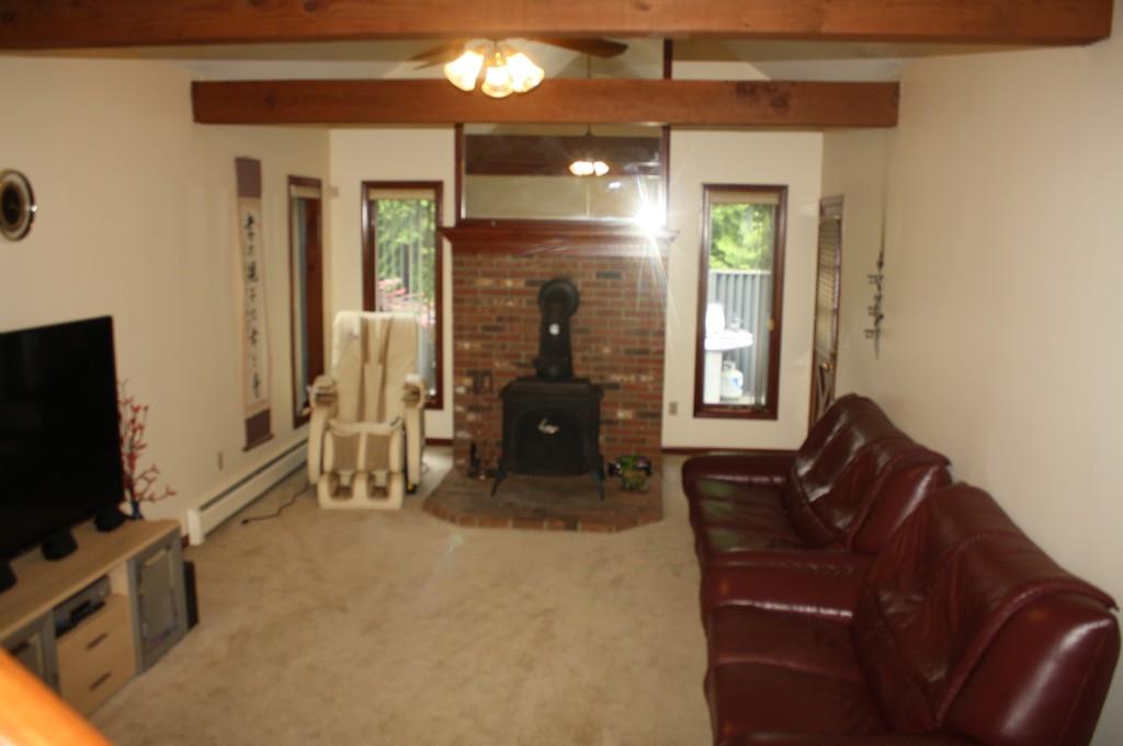 82 Stillwater Road Deerfield, MA 01373 - Photo 10 of 22 a living room with furniture and a flat screen tv