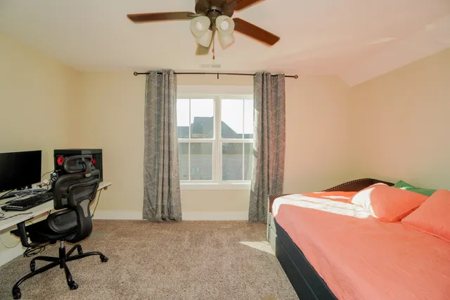 a view of a livingroom with a staircase