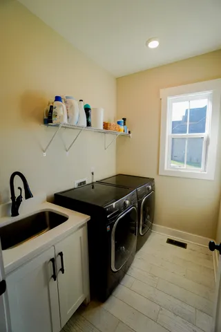 a store room with lots of clutter and flowers
