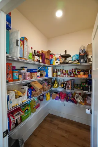 a view of a balcony with car parked