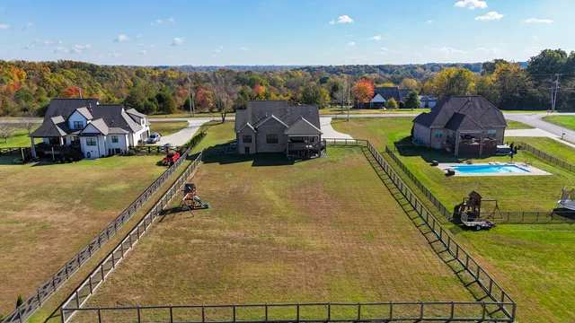 a view of a swimming pool with a patio