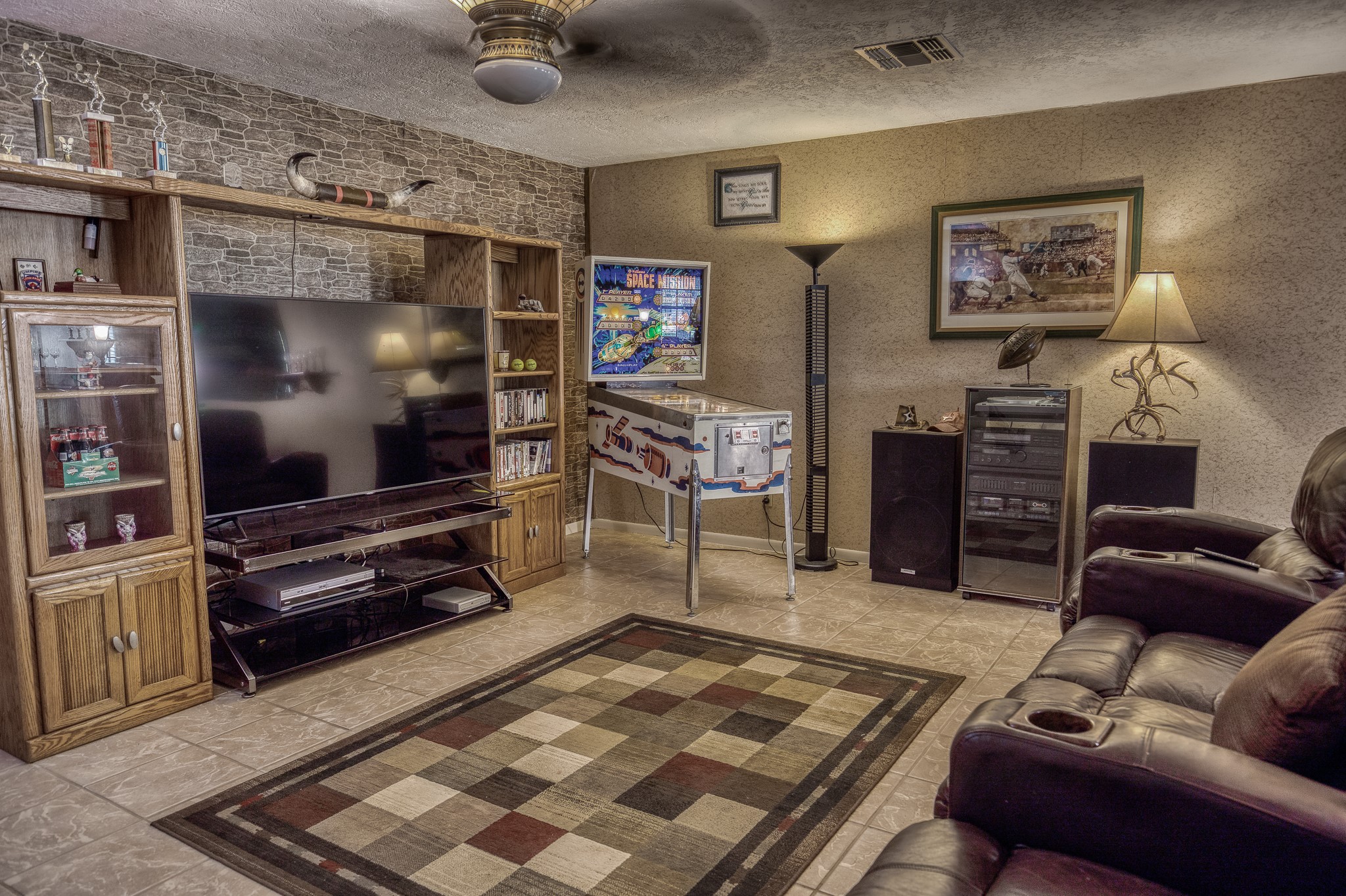 10639 Palestine Road Brenham, TX 77833 - Photo 19 of 42 a living room with furniture and a flat screen tv