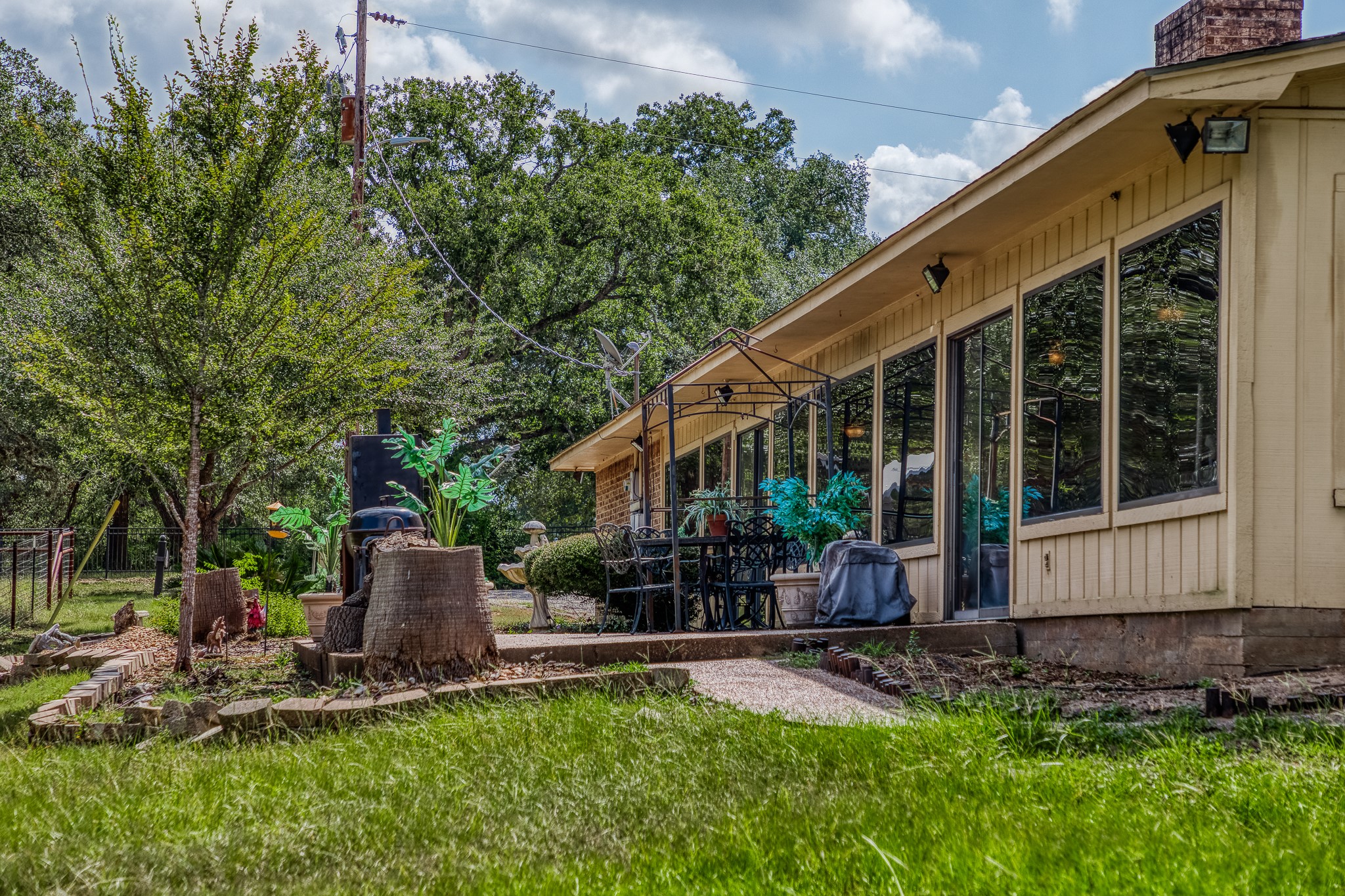 10639 Palestine Road Brenham, TX 77833 - Photo 37 of 42 a backyard of a house with seating space