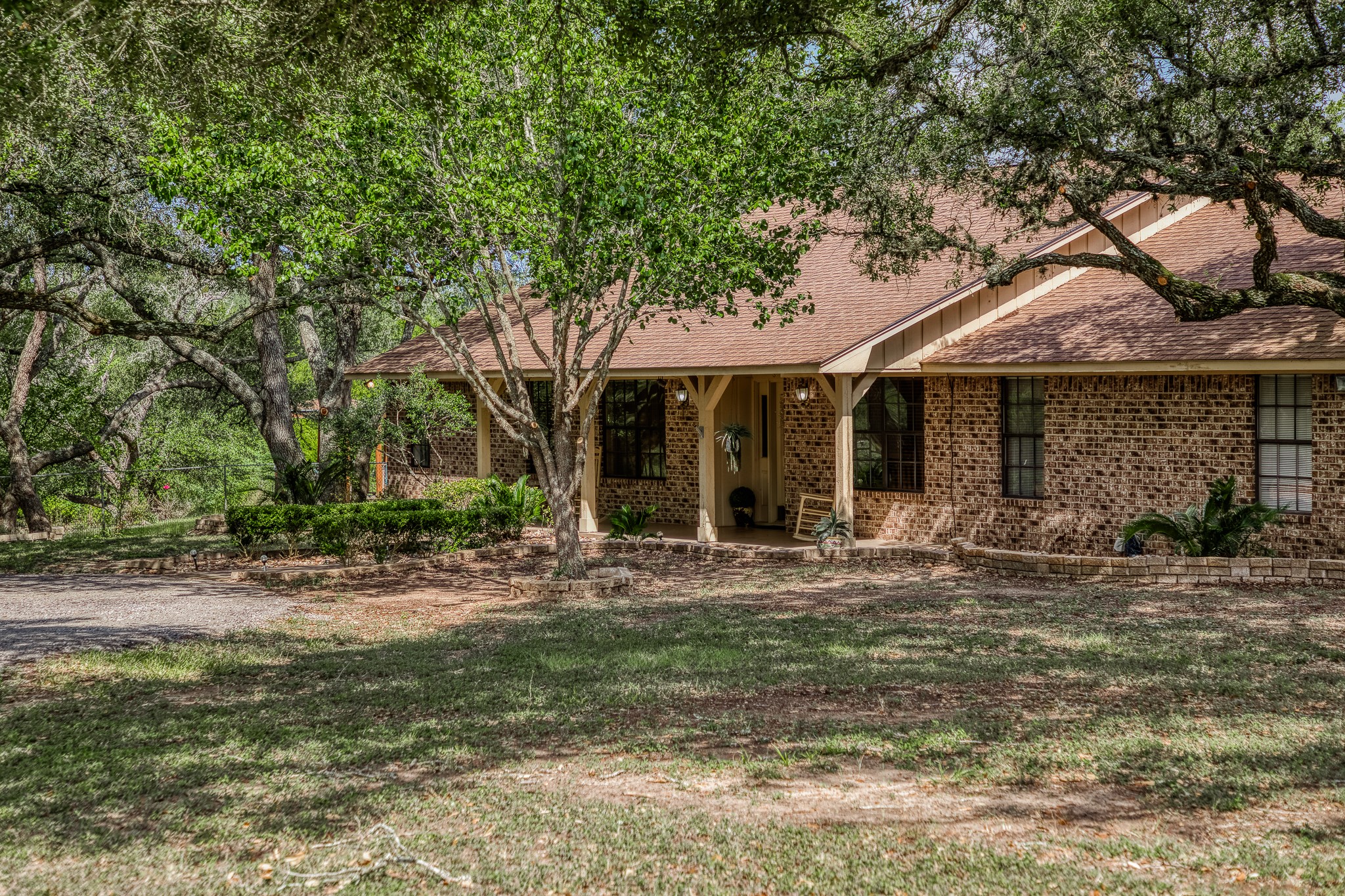10639 Palestine Road Brenham, TX 77833 - Photo 40 of 42 a front view of a house with garden