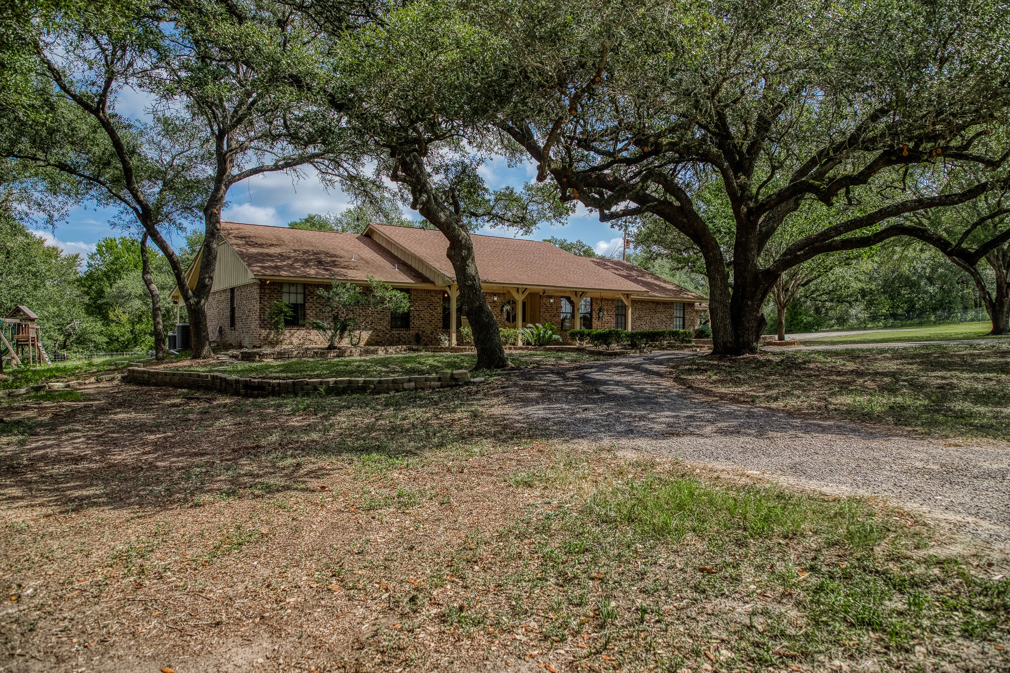 10639 Palestine Road Brenham, TX 77833 - Photo 42 of 42 a view of a house with a yard