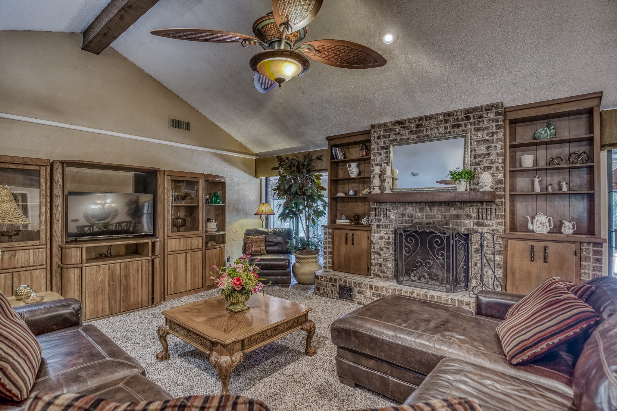 10639 Palestine Road Brenham, TX 77833 - Photo 8 of 42 a living room with furniture and a fireplace