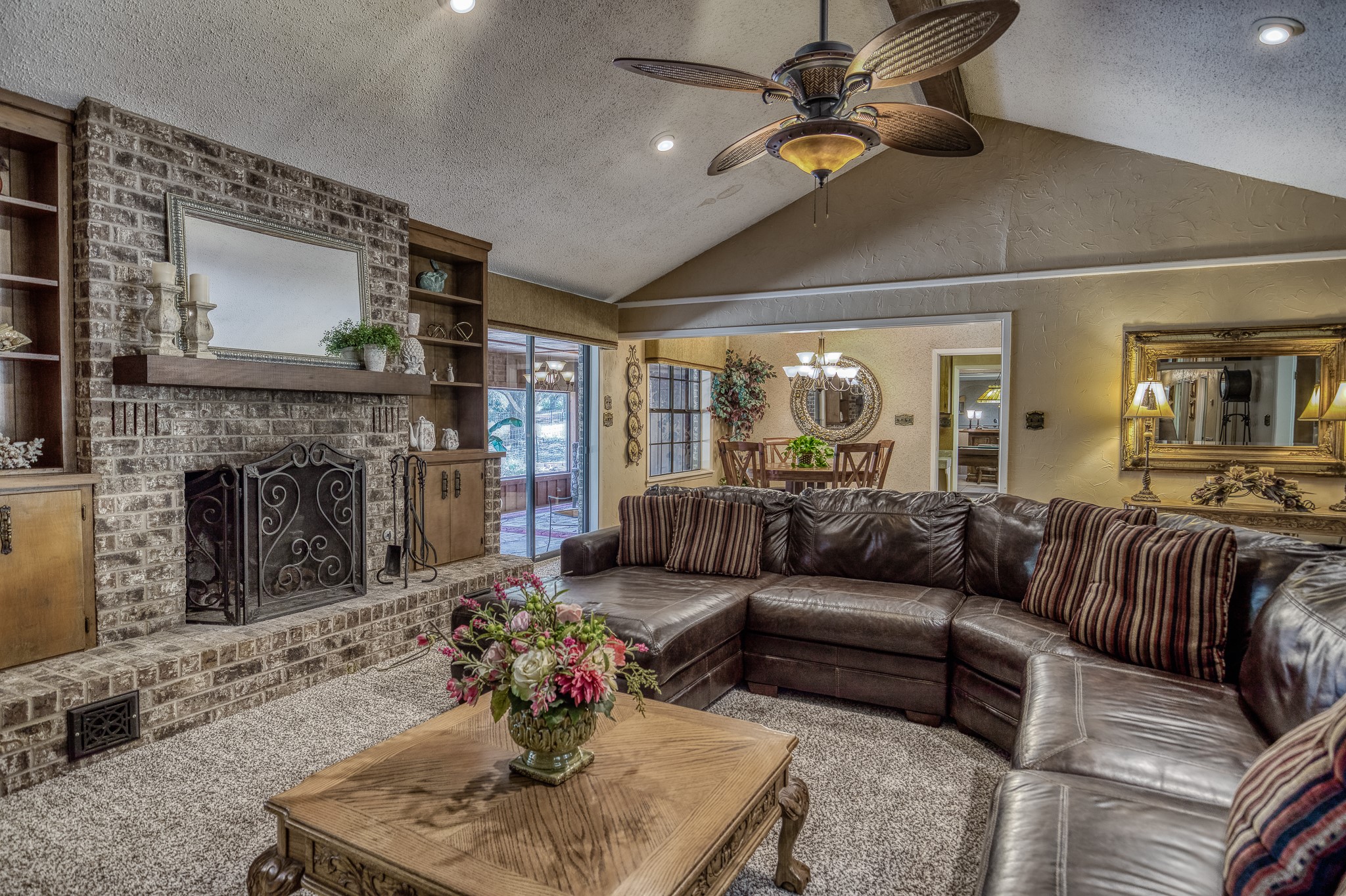 10639 Palestine Road Brenham, TX 77833 - Photo 9 of 42 a living room with furniture and a fireplace