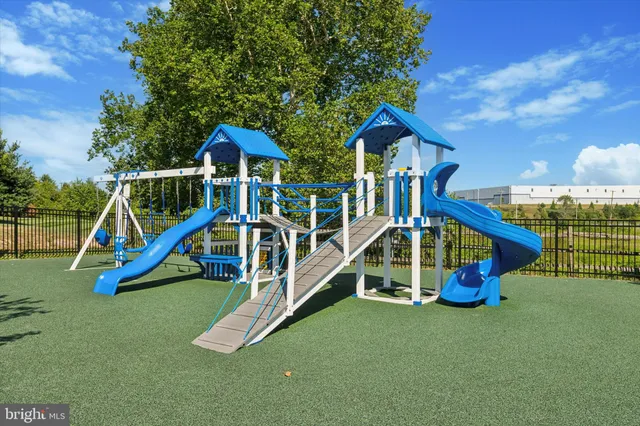 a view of a house with a park