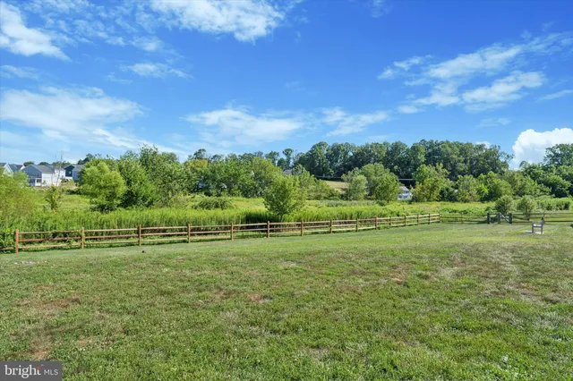 a view of a golf course with a yard