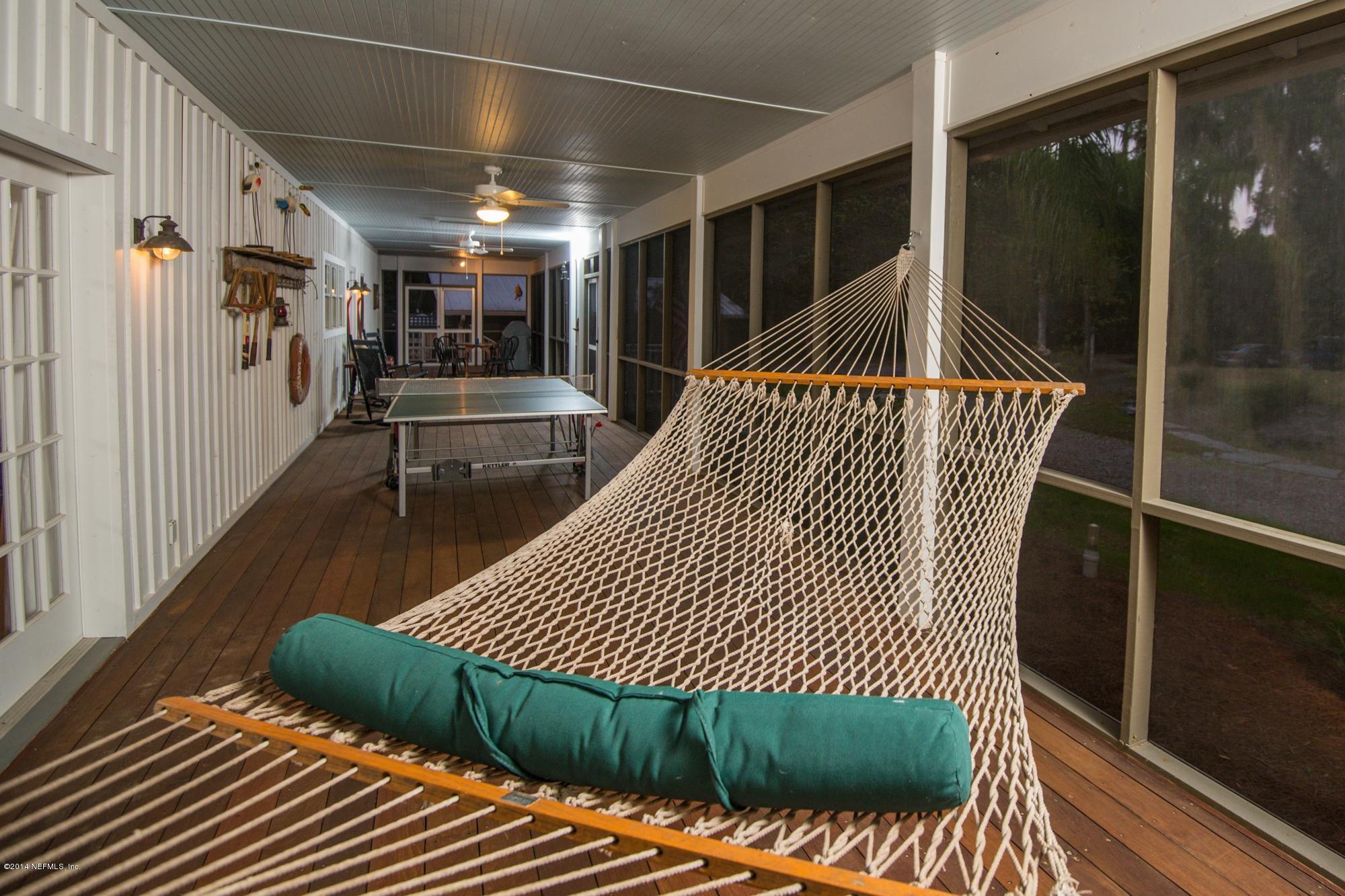 413 West River Road Palatka, FL 32177 - Photo 45 of 69 Screened Wrap-around porch