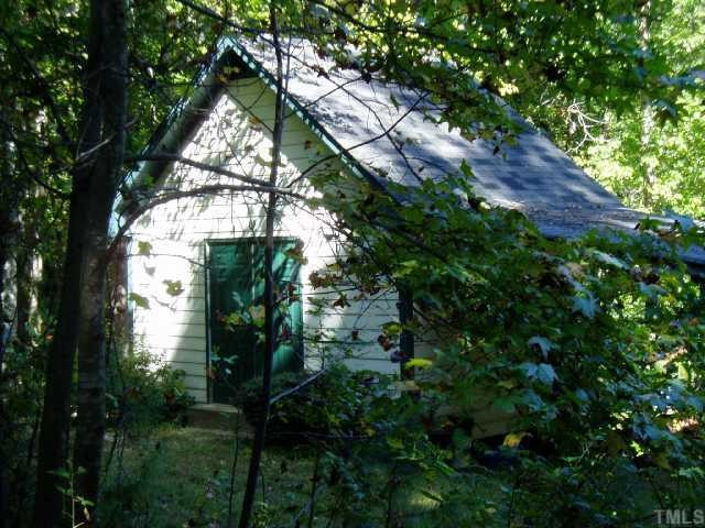 12000 Peed Road Raleigh, NC 27614 - Photo 7 of 12 Building in woods. Note shelter. Deck on back.