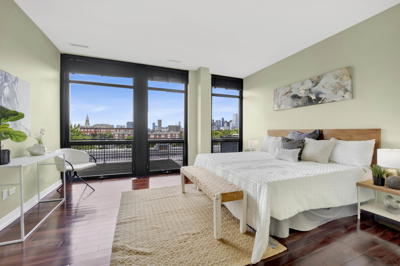 1069 West 14th Place, Unit 323 Chicago, IL 60608 - Photo 16 of 43 a spacious bedroom with a bed and glass windows