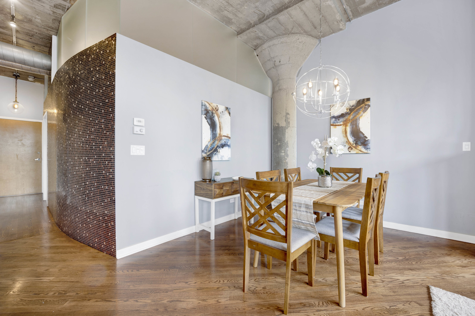 1069 West 14th Place, Unit 323 Chicago, IL 60608 - Photo 9 of 43 a view of a dining room with furniture