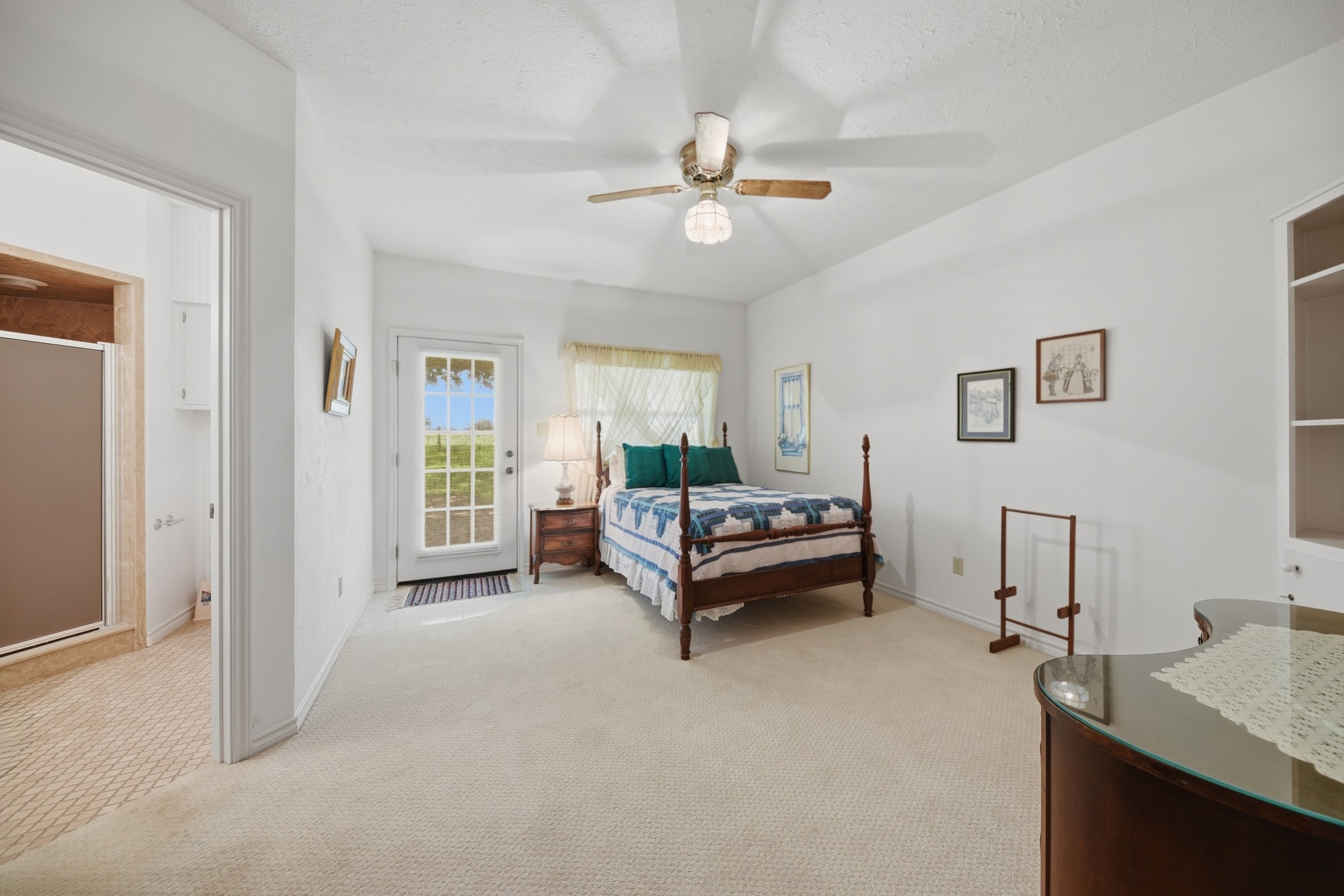 1552 Holub Road Schulenburg, TX 78956 - Photo 26 of 45 Bedroom 4 has outdoor access, carport, ensuite bathroom and big closet.