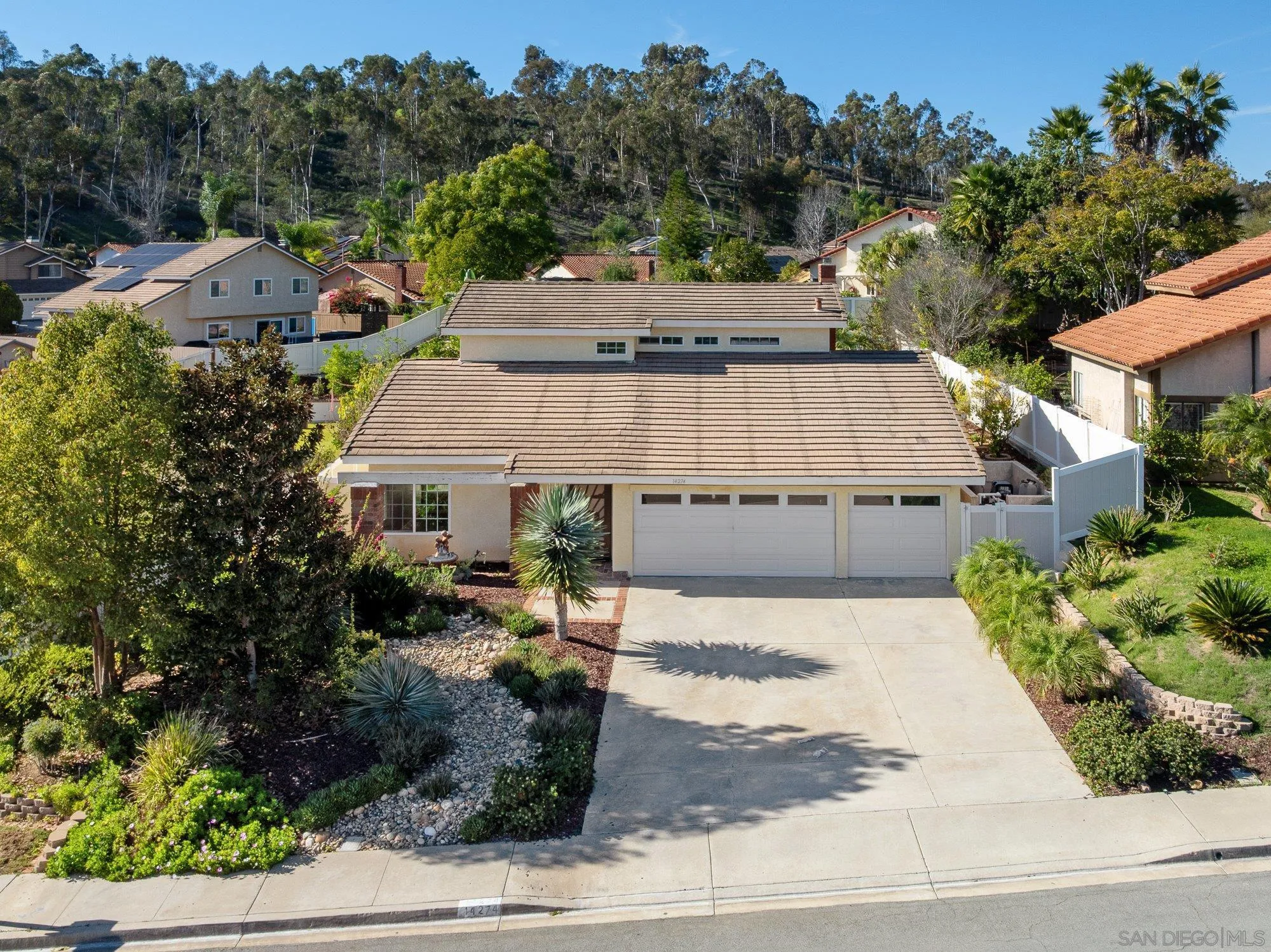 14274 Woodcreek Road Poway, CA 92064 - Photo 3 of 57 an aerial view of a house with a yard
