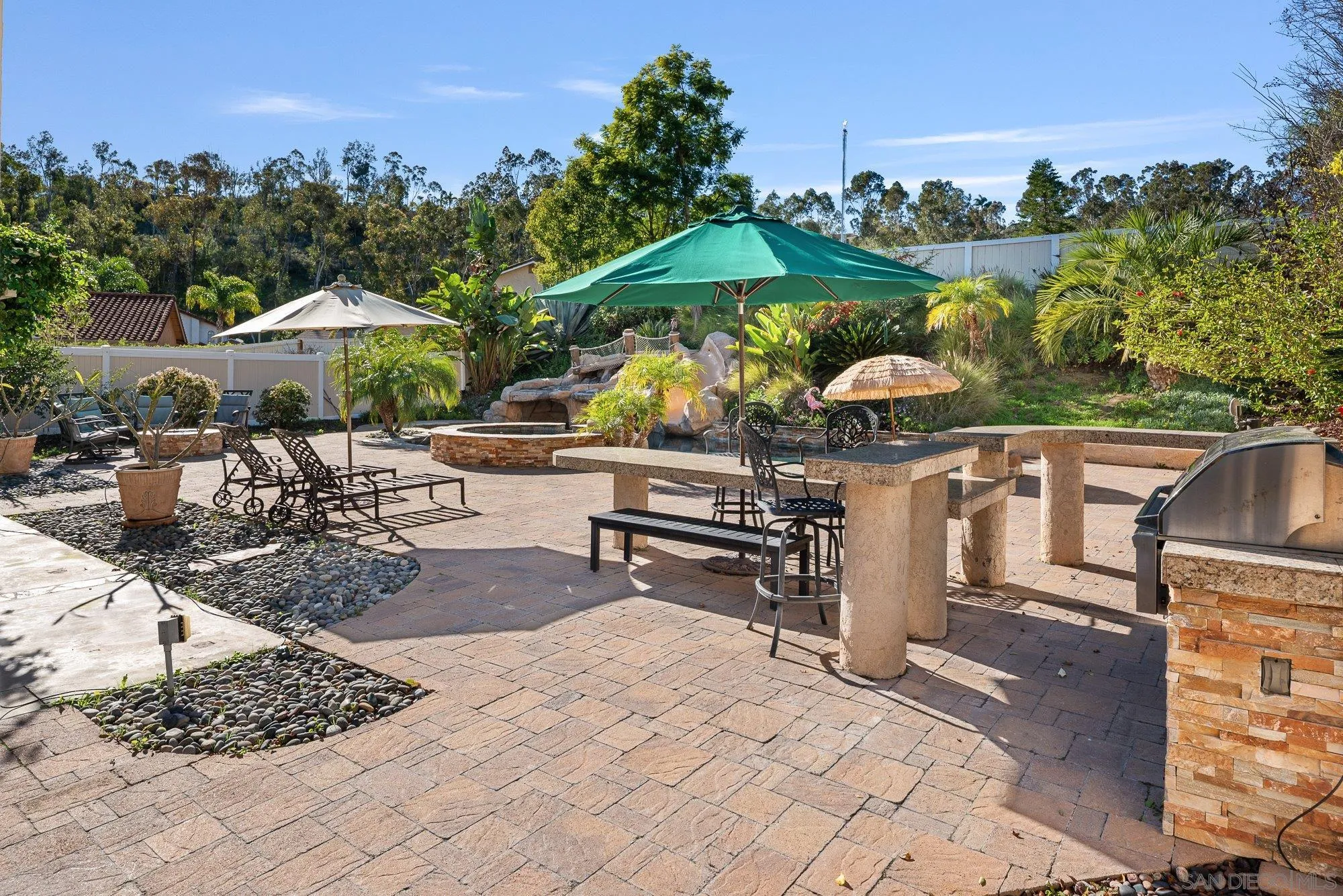 14274 Woodcreek Road Poway, CA 92064 - Photo 35 of 57 a view of a chairs and table in the patio