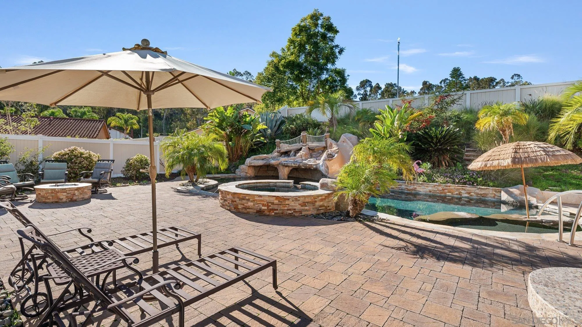 14274 Woodcreek Road Poway, CA 92064 - Photo 36 of 57 a view of a backyard with sitting area