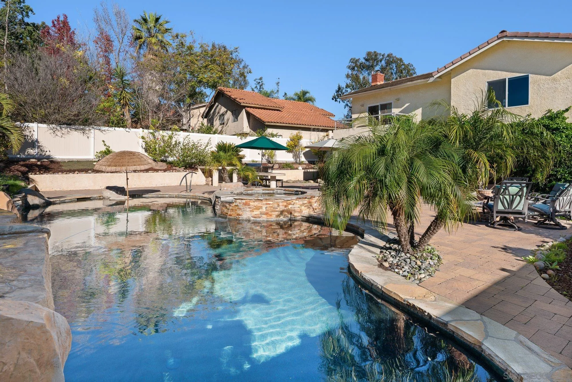 14274 Woodcreek Road Poway, CA 92064 - Photo 42 of 57 a view of a chairs and table in patio