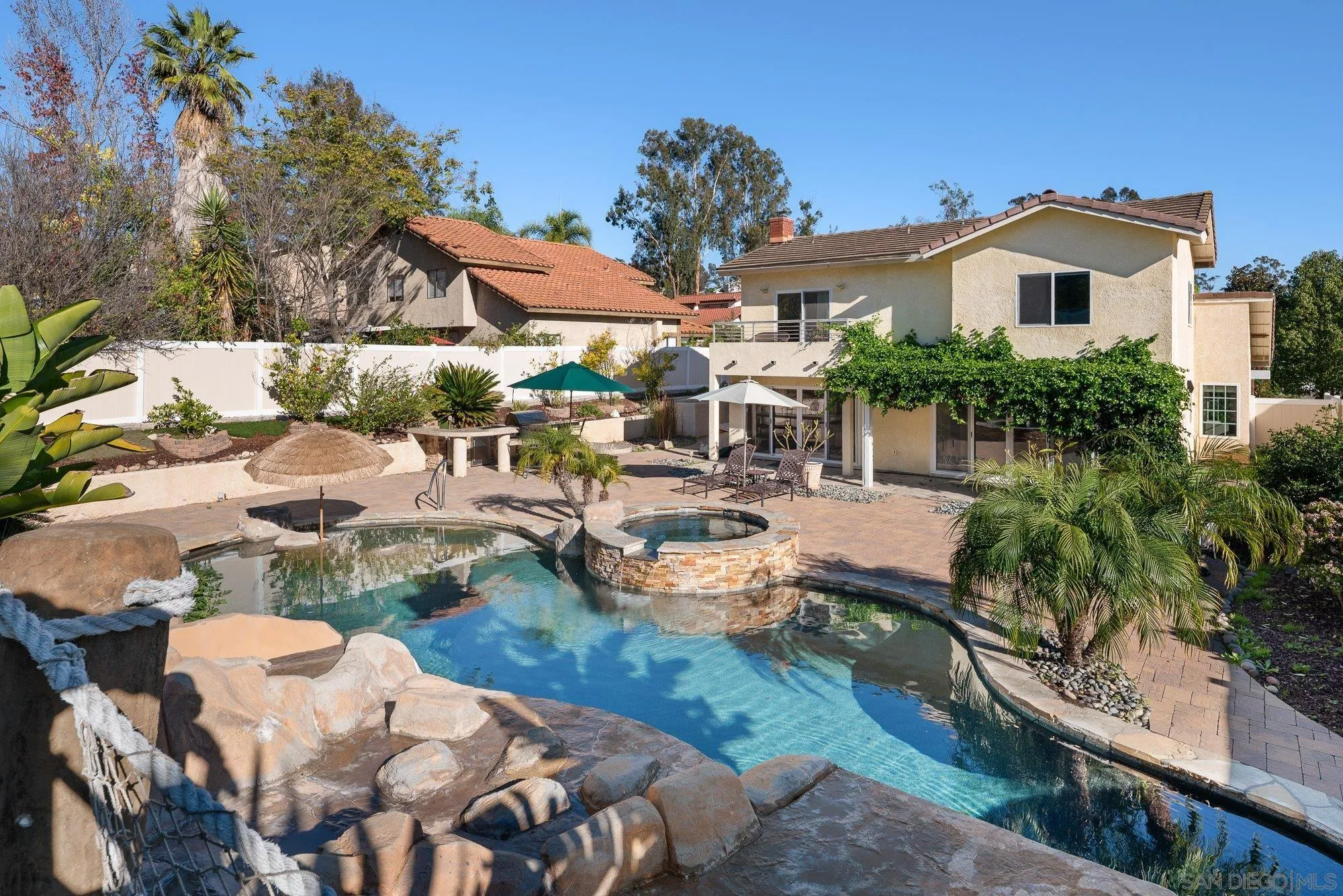 14274 Woodcreek Road Poway, CA 92064 - Photo 43 of 57 a view of a house with a yard and sitting area