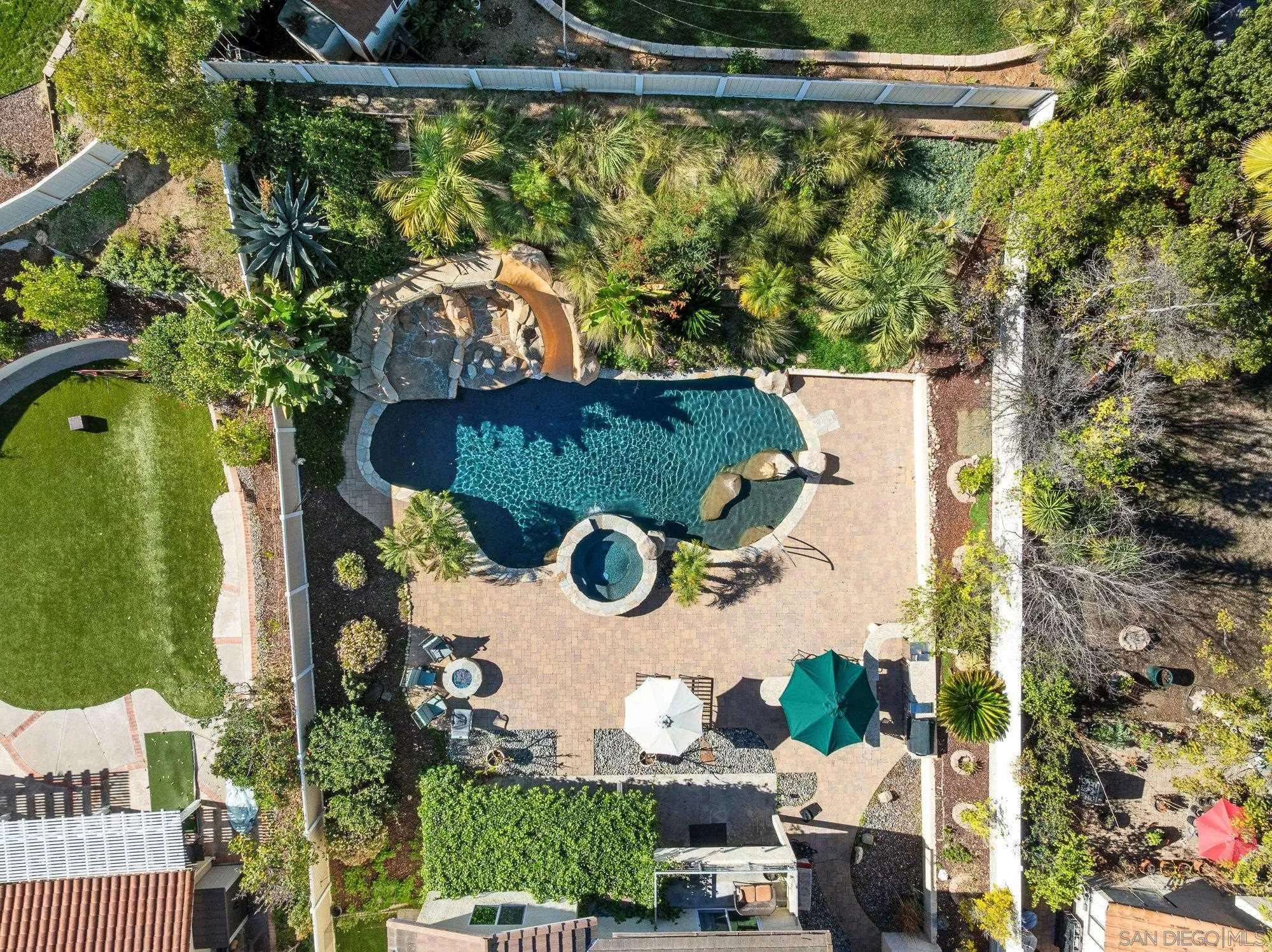 14274 Woodcreek Road Poway, CA 92064 - Photo 50 of 57 an aerial view of a house yard swimming pool and outdoor seating