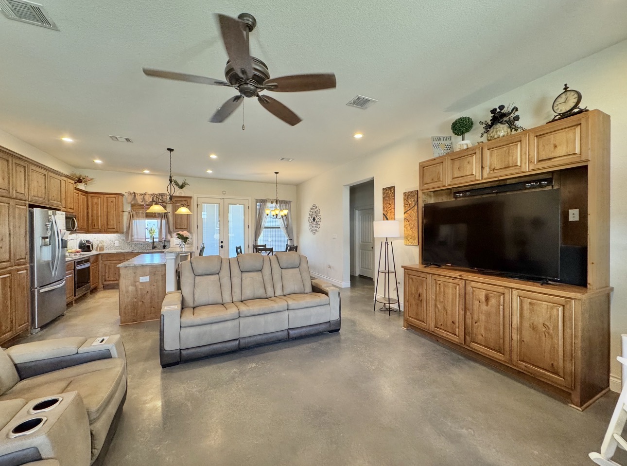 1094 Raintree Lane Elgin, TX 78621 - Photo 8 of 39 With built in entertainment center.