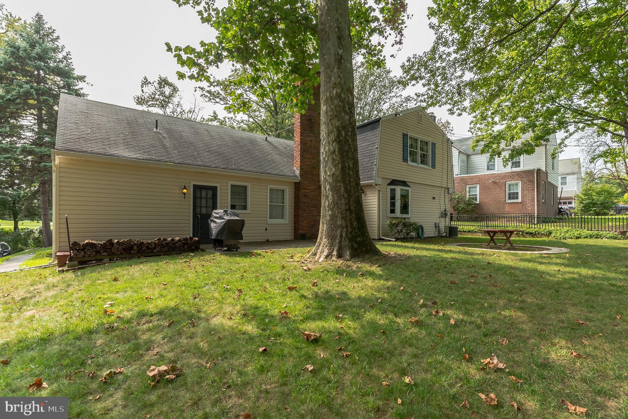 419 Ashmead Road Cheltenham, PA 19012 - Photo 25 of 27 Exterior back of the house with the backyard