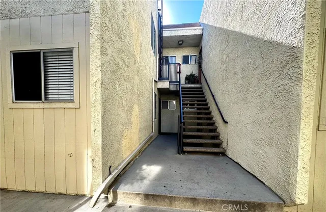 a view of a staircase with wooden floor and stairs