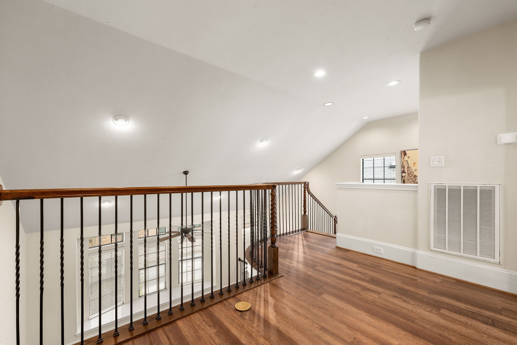 1353 Studer Street Houston, TX 77007 - Photo 14 of 35 a view of a hallway with wooden floor