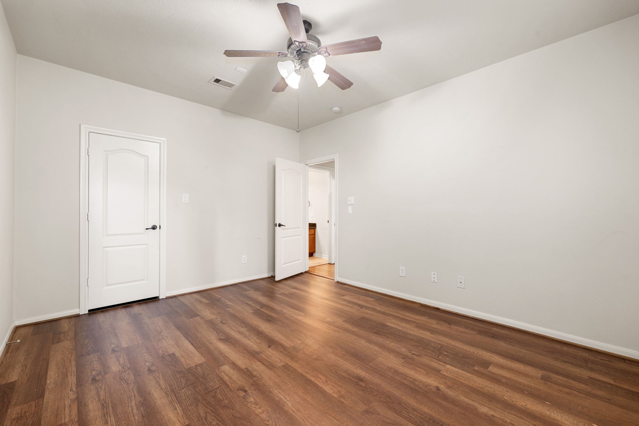 1353 Studer Street Houston, TX 77007 - Photo 26 of 35 a view of an empty room with wooden floor