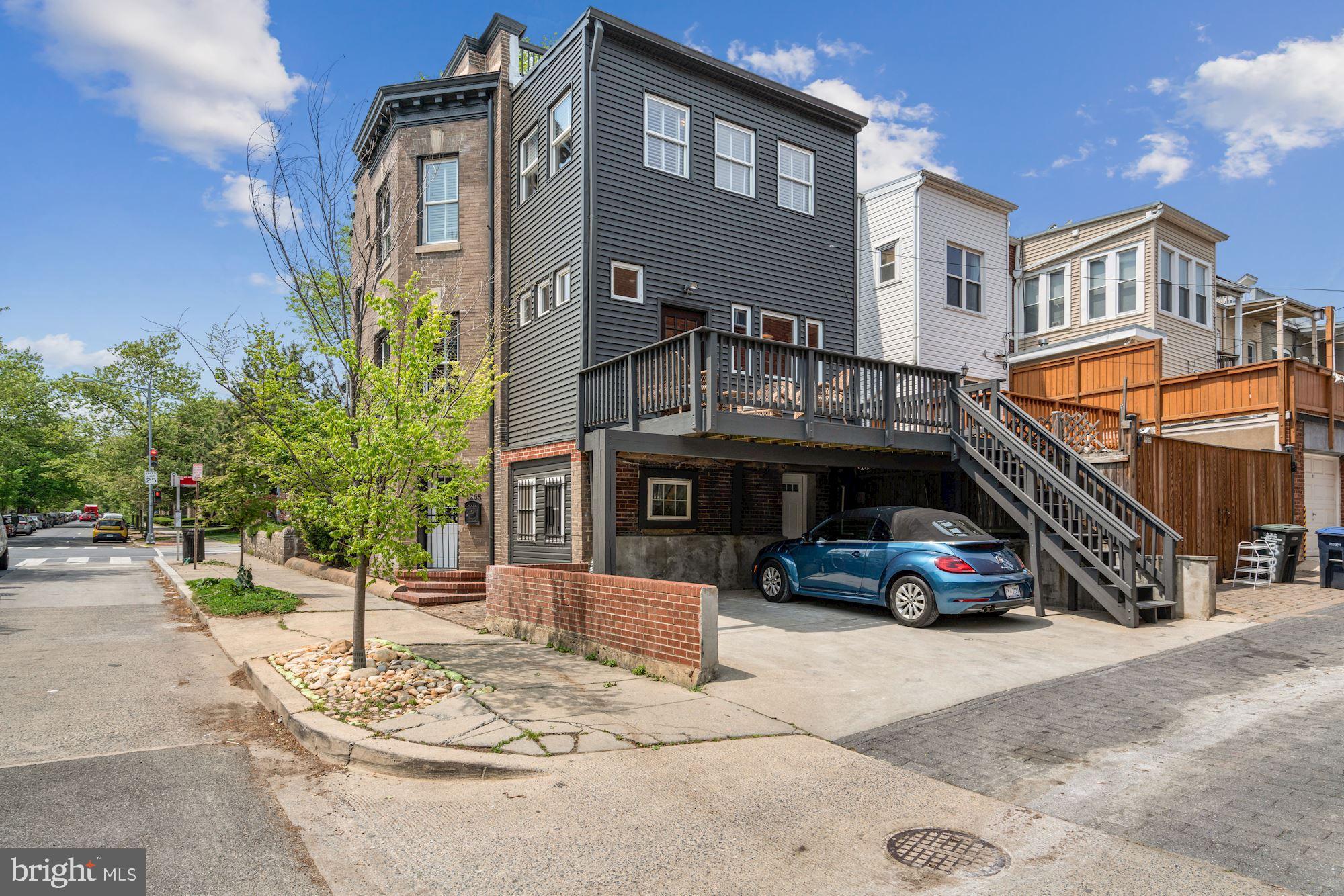 3001 13th Street Northwest, Unit B Washington, DC 20009 - Photo 11 of 11 a view of a car park in front of house