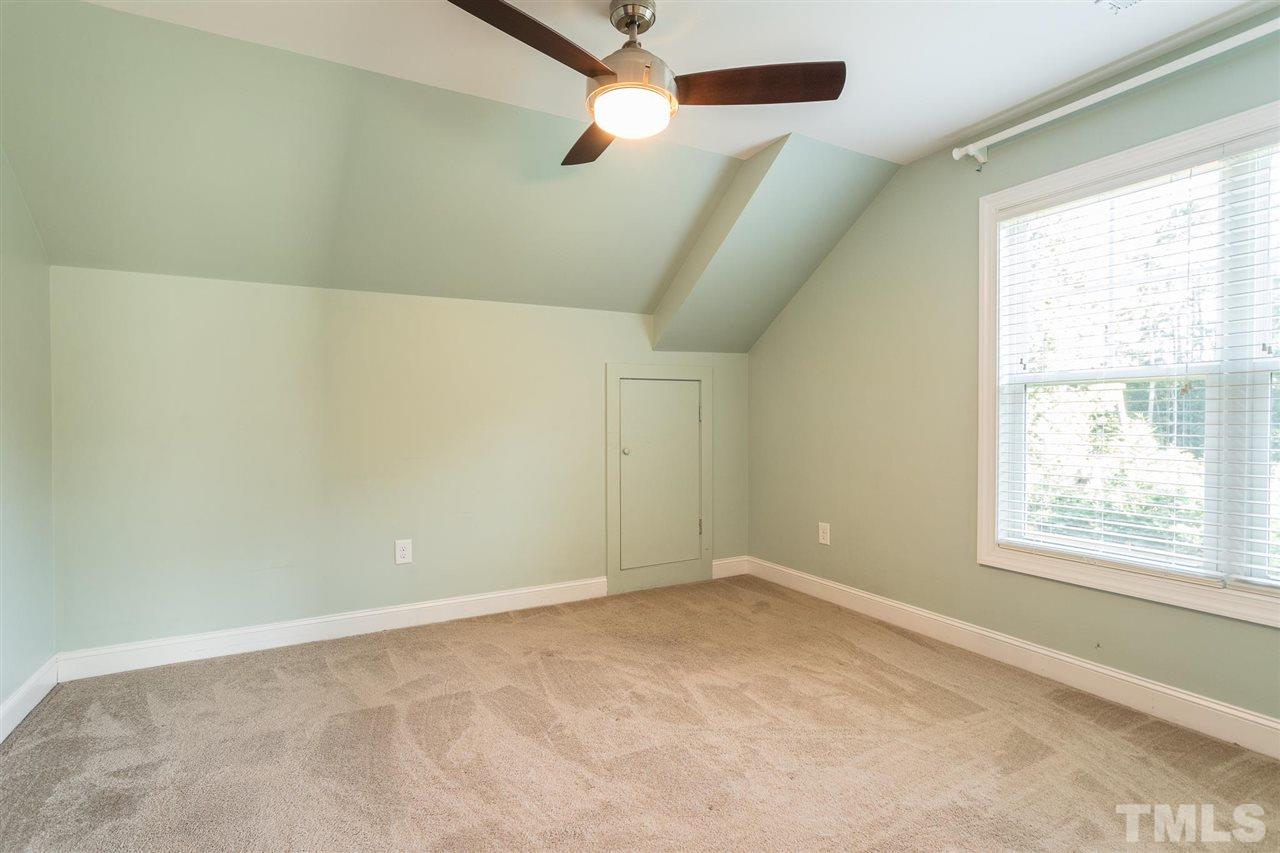 5316 Olive Road Raleigh, NC 27606 - Photo 20 of 29 a view of an empty room with a window
