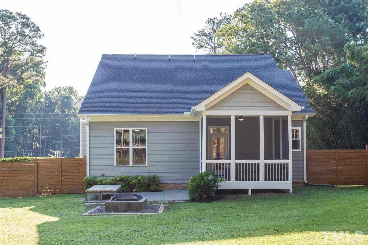5316 Olive Road Raleigh, NC 27606 - Photo 25 of 29 a front view of a house with garden