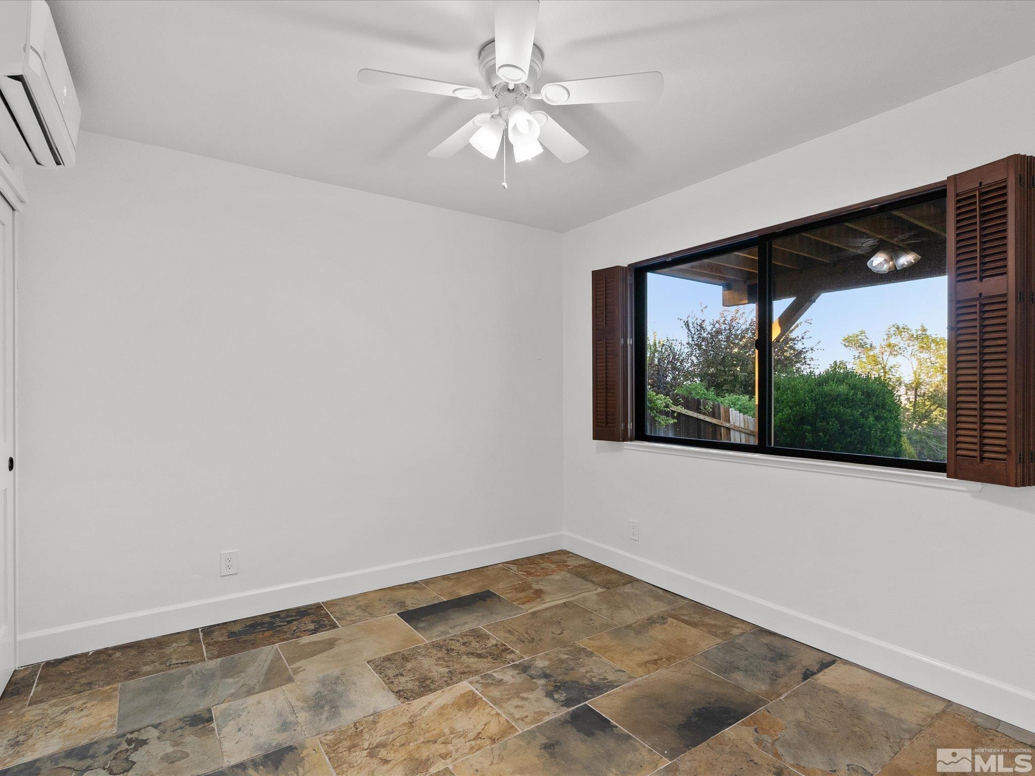 2036 Breen Drive Reno, NV 89509 - Photo 18 of 38 an empty room with a window