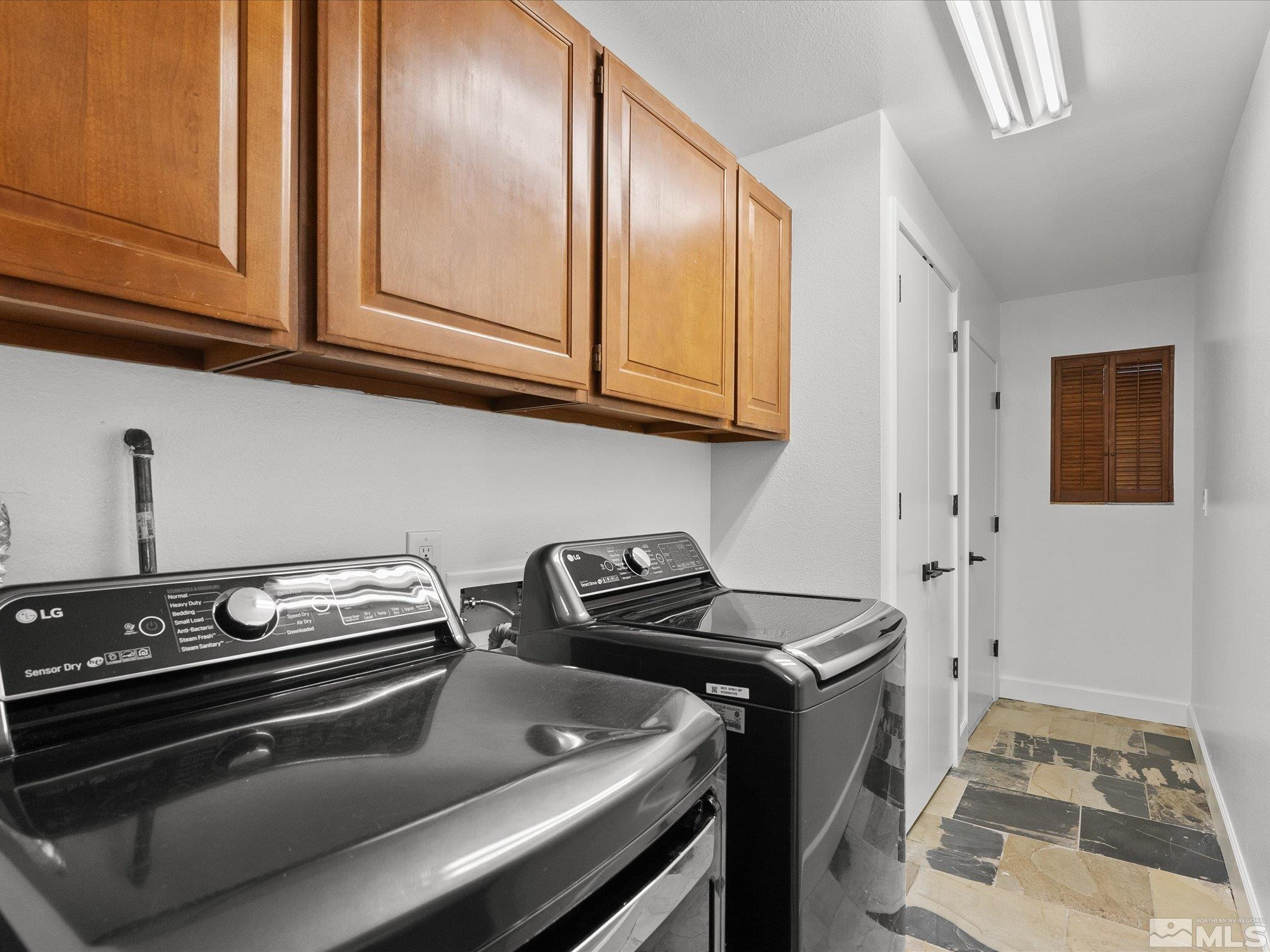 2036 Breen Drive Reno, NV 89509 - Photo 19 of 38 a kitchen with a stove and a sink